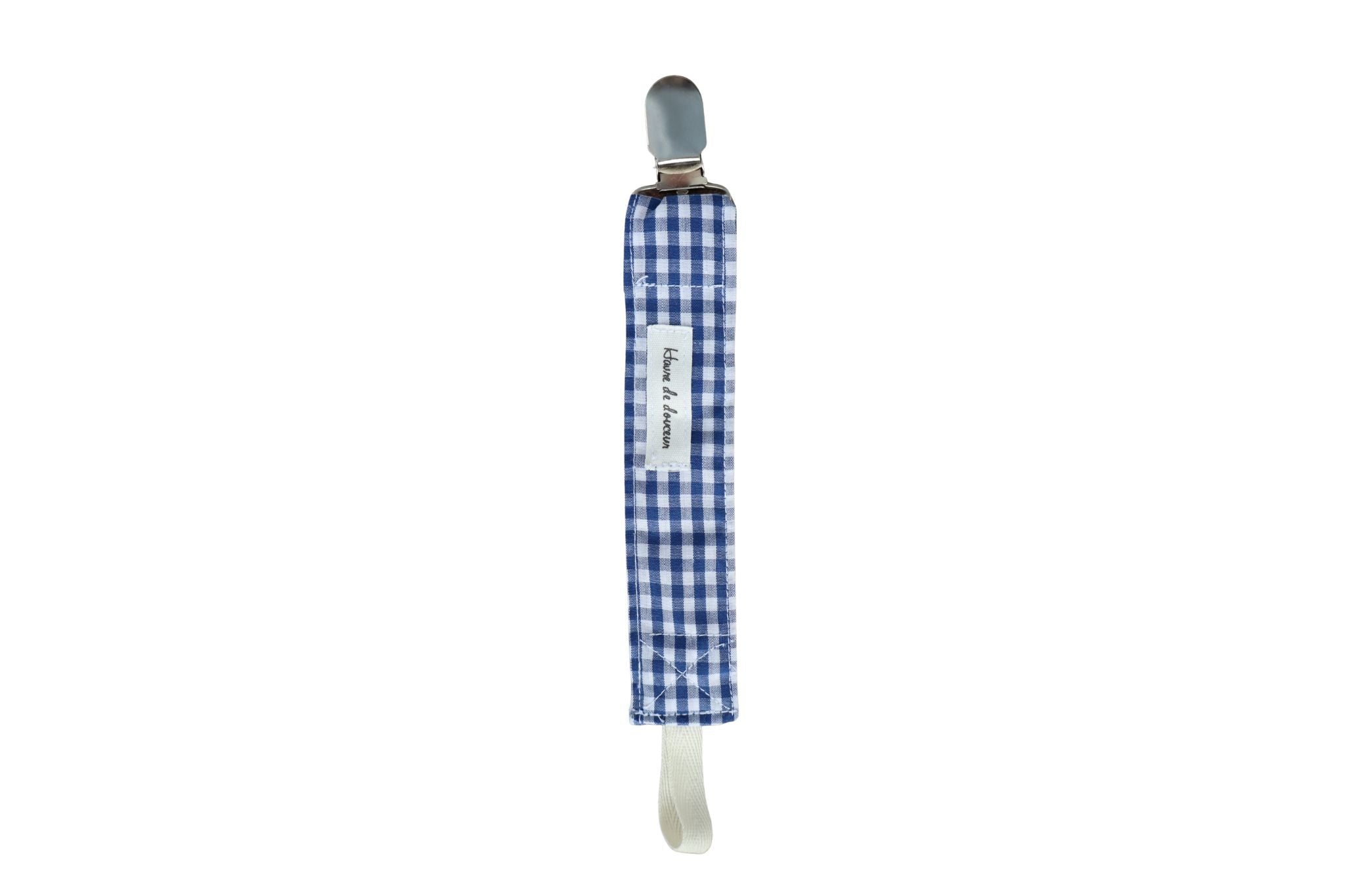 Attache à suce en tissu carreauté bleu